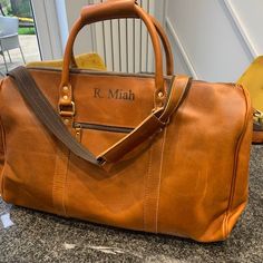 Personalized Mens Travel Bag, Full Grain Leather Duffel Bag, Monogrammed Duffle Bag, Weekend Luggage Bag,Unique Christmas Gifts,Carry-on Bag, Valentine Gift.  You can Buy a Matching Dopp Kit along with the Duffle Bag. 👇 Check out this item in my Etsy shop https://www.etsy.com/in-en/listing/911903635/personalized-leather-dopp-kit-bag Personalization :- If you want personalization then please select the appropriate drop down we can laser engrave Initials or Name or Logo on this item. Please leave your requirement in comment or message.  Best Seller! Genuine Leather Personalized Travel Bag! This is a highly durable bag that is made to last! This Leather Travel Bag is the perfect personalized gift for a carry on, gym bag, groomsmen gifts or for any loved one you want to give that special pers Classic Rectangular Duffle Bag For Trips, Classic Rectangular Travel Accessories For Weekend Trips, Classic Large Capacity Rectangular Travel Accessories, Rectangular Bags With Leather Lining For Overnight Trips, Brown Rectangular Briefcase For Weekend Trips, Classic Shoulder Duffle Bag For Weekend Trips, Classic Shoulder Travel Bag For Weekend Trips, Classic Rectangular Satchel For Weekend Trips, Classic Rectangular Shoulder Bag For Weekend Trips