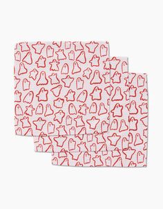 two red and white napkins with hearts on them