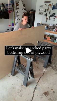 a man standing behind a wooden table in a garage with the words let's make a arched party backdrop out of plywood ages