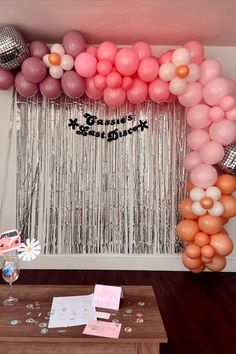 flower balloon arch, disco ball balloons, dazed and engaged bachelorette party decor, silver tassels, pink orange and purple color block balloon arch Last Dance Bachelorette, Flower Bachelorette Party Ideas, Dazed And Engaged Decorations, Bachelorette Picture Backdrop, Flower Power Decorations, Retro Bachelorette Party Ideas, Disco Party Bachelorette, Desert Disco Bachelorette Party, Retro Theme Bachelorette Party