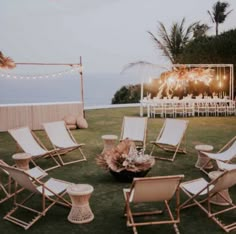 chairs and tables are set up on the lawn