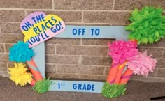 a sign that says on the places you'll go, off to 1st grade