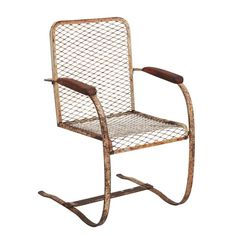 an old metal rocking chair with wooden seat