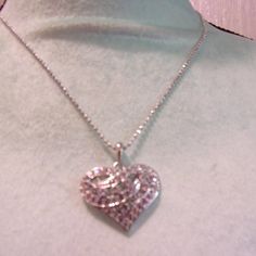 Nwt: Pretty Silver Tone Small Heart Necklace With Solid Clear Rhinestone In It, It Is 1" Across 1" High, It Is On A 18" Small Ball Chain Elegant Crystal Heart Pendant Rhinestone Necklace, Elegant Rhinestone Crystal Necklace With Heart Pendant, Elegant Crystal Rhinestone Heart Pendant Necklace, Glamorous Diamond Rhinestone Necklace As Gift, Glamorous Diamond Rhinestone Necklace For Gift, Sparkling Rhinestone Necklace For Gift, Anniversary Rhinestone Necklace With Diamond Accents, Sparkling Rhinestone Necklace For Anniversary, Elegant Crystal Rhinestone Necklace For Valentine's Day