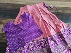 This Lehenga suits 6 yr - 7 yr. Kindly please contact us if needed measurements before purchase. Fitted Pink Cotton Silk Sharara, Pink Fitted Cotton Silk Sharara, Pink Cotton Silk Sets For Navratri, Pink Zari Work Cotton Silk Sets, Designer Pink Cotton Silk Set, Pink Cotton Silk Designer Set, Pink Cotton Silk Set, Cotton Silk Sets With Traditional Drape For Navratri, Navratri Cotton Silk Sets With Traditional Drape