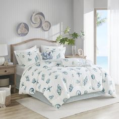 PRICES MAY VARY. 100%cotton 100%cotton bring a sense of the sea side into your home with this beautiful, casual beach house bedding collection. the shell pattern is printed in shades of blue onto a white, cotton brushed twill. naturally breathable and lightweight cotton fabric paired with down alternative hypoallergenic filling for a perfect all season bedding. "set includes: 1 comforter: 108"w x 96"l, 2 king shams: 20"w x 36"l, 1 bed skirt: 72"w x 84"l + 15"d" Beach House Bedding, Beach House Room, Beach Home Interiors, Cotton Comforter Set, Blue Comforter Sets, Blue Comforter, Harbor House, Decor Ikea, Tropical Home Decor