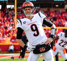 a football player is standing on the field