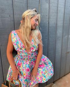 @savvcowan wears our exlusive Genovia Floral Mini Dress! This is the floral mini dress of your dreams! Knee-length Multicolor Mini Dress For Garden Party, Flirty Knee-length Mini Dress For Garden Party, Flirty V-neck Dress For Summer Parties, Flirty Mini Dress For Summer Parties, Sundress For Summer Parties In Mini Length, Sundress For Summer Parties, Mini Length, Flirty Knee-length Mini Dress For Vacation, Floral Print V-neck Mini Dress For Summer Parties, Flirty Floral Print Dresses For Summer Parties