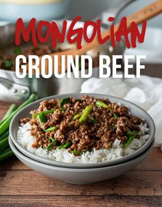 a close up of a bowl of ground beef and rice on a table with green beans