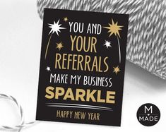 a card that says, you and your referals make my business sparkle happy new year