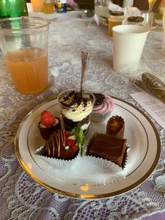 a plate with some desserts on top of it