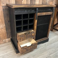 an old fashioned wooden cabinet with drawers