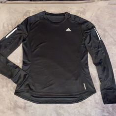 Aeroready Water Absorbent & Feel Dry Adidas Go-dry Tops For Running, Adidas Crew Neck Running Tops, Adidas Functional Crew Neck Top, Adidas Fitted Long Sleeve Activewear, Adidas Long Sleeve Workout Top, Adidas Black Athleisure Tops, Black Adidas Long Sleeve Activewear, Adidas Black Long Sleeve Activewear, Black Stretch Adidas Tops