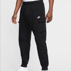 New With Tags Size Xxl 2xl Black Cotton Sweats With Pockets, Black Nike Cargo Pants With Side Pockets, Black Fleece Lounge Pants, Black Nike Cargo Pants With Pockets, Black Athleisure Joggers With Side Pockets, Nike Cargo Pants With Pockets, Sportswear Style, Black Sports Sweats With Pockets, Nike Sportswear Cargo Pants With Pockets, Sportswear Sweatpants With Cargo Pockets For Jogging