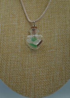 Glass Vial with Tiny Multicoloured Sea Glass Pieces & Adjustable Necklace (P#55) Glass Vials, Glass Pieces, Sea Glass Necklace, Mini Heart, Adjustable Necklace, Cotton Cord, Glass Necklace, Tan Color, Sea Glass