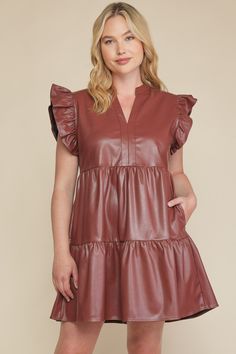 Faux leather tiered mini dress featuring ruffle sleeves. Pockets at side. Unlined. Woven. Non-sheer. Lightweight. Brown Ruffled Mini Dress With Short Sleeves, Brown Ruffled Short Sleeve Mini Dress, Brown Short Sleeve Mini Dress With Ruffles, Brown Mini Dress With Ruffles And Short Sleeves, Chic Brown Mini Dress With Ruffle Hem, Fall Mini Dress With Ruffle Sleeves, Chic Brown Mini Dress With Ruffles, Brown Tiered Ruffle Dress, Brown Tiered Dress With Ruffles