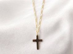 ∙ ∙ S I M P L E ∙ C R O S S ∙ N E C K L A C E ∙ ∙ Made with the following: 14K Gold Filled Cross Pendant 16mm x 10mm 14K Gold Filled Findings  14K Gold Filled Lobster Claw 14K Gold Filled Chain This listing is for one necklace.  ∙ ∙ H O W ∙ T O ∙ O R D E R ∙ ∙ Please select the chain and length from the drop-down menu. Please select if you would like a 2-inch extender chain from the drop-down menu. The 2-inch extender gives you the flexibility to wear the necklace the length you choose and up to Small Cross Necklace, Cross Necklace Simple, Cross Necklace Gold, Fairy Jewelry, Gold Filled Necklace, Gold Cross Necklace, Necklace Layering, Small Crosses, Necklace Box