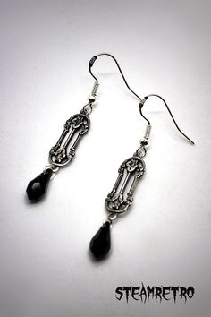 "These fantastic victorian style filigree earrings are part of our new Dark Gothic range, and are a step away from our previous steampunk work. There are numerous Gothic designers out there, and various marketplaces to purchase Gothic jewellery, but i am sure you will like what we are doing here Growing up in the 80's i lived through the \"goth\" movement, many a lost weekend was spent watching Bauhaus, Sisters, Nephilim etc, travelling to gigs all around the U.K, and one of the most interesting Black Gothic Drop Plug Earrings, Black Vintage Pierced Earrings, Vintage Black Pierced Earrings, Victorian Black Dangle Earrings, Black Victorian Dangle Earrings, Victorian Black Earrings For Evening, Black Victorian Pierced Earrings, Victorian Black Pierced Earrings, Black Victorian Earrings For Evening