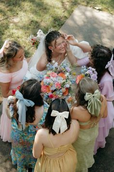 a group of women standing next to each other