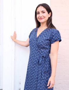 Made with 100% woven cotton Handwoven ikat fabric Designed in New Orleans Handmade in India This blue and white wrap dress is an instant mood boost for the cooler days ahead. Add a sweater or a blazer and you'll be ready for whatever weather heads your way. The Twilight Wrap Dress has a hook and eye closure at the bust and side pockets. Curve friendly and flattering for all body types. This blue and white wrap dress is great for nursing or pumping mothers. Model: Model is 5'3" and wears XS True Casual Cotton V-neck Wrap Dress, Chic Fitted Cotton Wrap Dress, Casual Blue Wrap Dress With Surplice Neckline, Casual Wrap Dress With Surplice Neckline For Day Out, Casual V-neck Cotton Wrap Dress, Casual Wrap Dress With Tie Waist, Fitted Casual Wrap Dress For Daywear, Casual Fitted Wrap Dress For Daywear, Casual Fitted Wrap Dress For Workwear