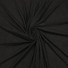 a black fabric with a spiral design on it