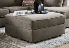 a living room scene with focus on the ottoman