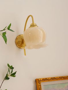 This Morup Wall Lamp with lily of the valley adds a touch of sophistication to any wall. The elegant cream finish fitting has string shades with matching curved arms and an ornate central column, as well lily of the valley lampshade.   If you have any questions about our products, please contact us and we will reply to you within 24 hours.   The same series of products >>>     Product Size   Size: L 5.5 x W 9.1  x H 9.8  / L 14cm x W 23cm  x H 25cm     Details   Materials:  Brass , Resi Resin Light, Luxury Lamps, Valley Flowers, Lift Design, Cute House, Room Accessories, Plant Mom, Edison Bulb, Lamp Sets