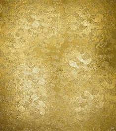 an old gold background with some very pretty designs on the edges, and it looks like something out of space