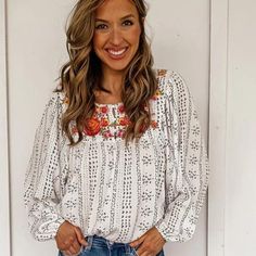 Take A Bold Risk With Our Beige Long Sleeve Embroidered Print Blouse. This Light And Pretty Blouse Boasts A Round Neck, Billow Sleeves, And Stunning Embroidery Details. Made Of 100% Polyester, This Blouse Is Perfect For Adding A Touch Of Adventure To Your Wardrobe. **New** Embroidered Long Sleeve Blouse For Brunch, Long Sleeve Embroidered Blouse For Brunch, White Bohemian Peasant Top With Chikankari Embroidery, White Embroidered Long Sleeve Blouse, White Long Sleeve Tops With Intricate Embroidery, Bohemian White Peasant Top With Embroidered Sleeves, White Bohemian Peasant Top With Embroidered Sleeves, Spring Vacation Blouse With Intricate Embroidery, White Long Sleeve Blouse With Embroidered Sleeves