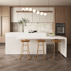 two stools are in front of the kitchen island