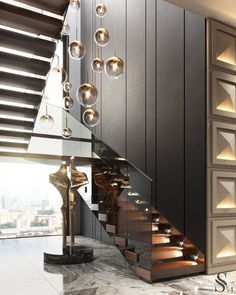 an elegant staircase with glass balconies and lights