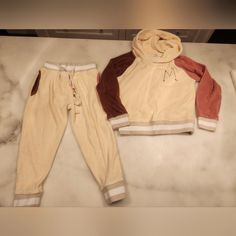 Terry Sweatsuit. Worn Only 1x. The Pants Were Too Big For My String Bean So We Didn't Get The Use Out Of This We Would Have Likes. Super Cute. Practically Brand New Casual Cream Playwear Sets, Casual Cream Sets For Playwear, String Bean, Sweat Suit, Matching Sets, Kids Shop, Super Cute, Brand New, Cream