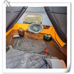 the inside of a tent that is set up for camping