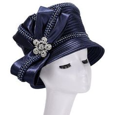 The Giovanna HR22112-NVY Church Hat is the epitome of grace and style, making it an essential accessory for anyone with a penchant for refined fashion. Carefully crafted from premium materials, this church hat presents an iconic silhouette that complements any face shape with its universally flattering design. The rich navy hue makes for a striking statement, allowing it to pair seamlessly with a wide range of colors and patterns. It's the attention to detail that truly sets this hat apart - dec Elegant Winter Formal Cloche Hat, Elegant Winter Cloche Hat With Short Brim, Elegant Evening Hats For Winter, Elegant Adjustable Mini Fedora Hat, Elegant Adjustable Top Hat, Elegant Wide Brim Cloche Hat For Formal Occasions, Elegant Adjustable Mini Fedora, Elegant Adjustable Mini Hats For Winter, Elegant Evening Winter Hats