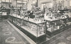 an old time store filled with lots of bottles and glass cases full of liquors