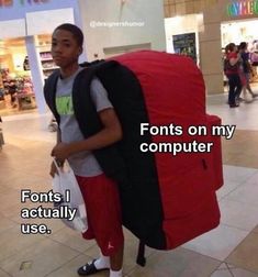 a young man carrying a large red backpack in a mall with the words fonts on my computer