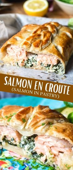 salmon en croute with spinach in pastry form on colorful plate next to lemon wedge