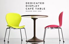 three chairs and a table with the words dedicated display cafe table