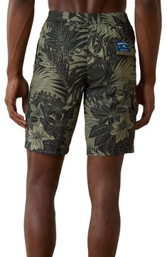 Take a refreshing dip in these sunny-day swim trunks designed with handy pockets and a comfy elastic waist. Lace-up closure Side-seam pockets; back flap-patch pocket with drainage grommets 100% recycled polyester Machine wash, tumble dry Imported Summer Beach Bottoms With Cargo Pockets, Summer Beach Cargo Shorts With Side Pockets, Beach Cargo Shorts For Summer, Green Hawaiian Style Short Bottoms, Green Tropical Swim Trunks With Built-in Shorts, Tropical Beach Bottoms With Pockets, Green Swim Trunks With Pockets For Summer, Green Beach Shorts With Pockets, Green Shorts For Warm Weather