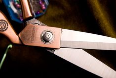 a pair of scissors that are sitting on a table