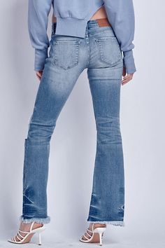 Details Style No. AT1029BTM Elevate your denim collection with Low Rise Stretch Distressed Bootcut Jeans – a fusion of comfort, style, and edgy design that adds a unique touch to your ensemble. Highlights Super Stretchy Denim Comfort High-Quality Material Distressed Detail Low Rise Chic Natural Frayed Hem Medium Stone Wash Shape & fit Bootcut Low rise Frayed Hem Specifications: Front Rise: 8 inches Inseam: 32 ½ inches Leg Opening: 19 inches Model Details: MODEL IS 5' 9" WEARING SIZE 26 Chic Natural, Edgy Design, Denim Collection, Comfort Style, Vintage Jeans, Bootcut Jeans, Low Rise, High Quality, How To Wear