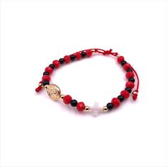 Protection Bracelet Beautiful, simple, and delicate handmade 4mm red crystal separated by 3mm round black onyx beads and 2mm gold-filled balls, over a 1mm red nylon cotton cord. It features 2 powerful protection beads as: - 8 mm Mother of Pearl Cross - 1cm St. Benedict medal 18K gold plated. It is adjustable from 6 to 8 inches. This is a perfect accessory for protection and daily wear and as Christmas, Birthday, Thank you gift for any woman. Each item is carefully shipped in an organza pouch, bu Red Spiritual Bracelet With Black Beads, Elegant Adjustable Red Rosary Bracelet, Red Adjustable Gemstone Beaded Bracelets, Elegant Red And Black Beaded Bracelets, Adjustable Red Gemstone Beaded Bracelets, Adjustable Red Beaded Gemstone Bracelets, Red Spiritual Crystal Bracelet With Faceted Beads, Spiritual Red Crystal Bracelet With Faceted Beads, Red Bracelets With Black Round Beads