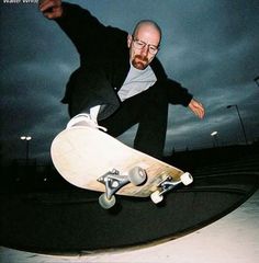 a man riding a skateboard up the side of a ramp at night with dark clouds in the background