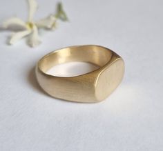 Classic pinky signet ring in an oval design, dainty minimalist ring jewelry for women, available in 14k gold plating, sterling silver and in 9k solid yellow gold.  This delicate handmade gold ring is elegant and minimalist. It was made by carving wax and casting it into metal.  It is available in high-quality 14k gold plating over brass, 14k gold plating over sterling silver, sterling silver and in 9k solid yellow gold.  This ring is very comfortable to wear and great for everyday use, and will Modern Oval Signet Ring As Promise Ring, Modern Oval 14k Stamped Signet Ring, Modern 14k Stamped Oval Signet Ring, Minimalist 14k Gold Oval Signet Ring, Yellow Gold Oval Signet Ring For Promise, Yellow Gold Oval Signet Promise Ring, Modern Gold Oval Initial Ring, Oval Rings With Simple Design For Gifts, Minimalist Initial Ring With Polished Finish And Oval Shape