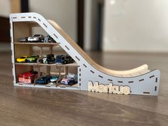 there is a toy car set in the shape of a ramp that says markus