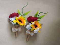 two small bouquets with flowers are on the table