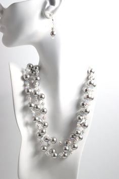 Our Silver Elegance necklace is a stunning accessory that pays tribute to classic elegance with its graceful, cascading strands of pearls, rhinestones and crystals. Featuring gorgeous Swarovski© glass pearls in different hues, a sparkling rhinestone ball and Swarovski© Crystals. Silver chain is adjustable ready to fit any outfit. Make it your own, and wear it in any way that suits you. Silver Strand, Murano Glass Beads, Swarovski Pearls, Classic Elegance, Artisan Jewelry, Semiprecious Stones, Precious Stones, Freshwater Pearls, Silver Chain