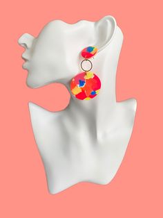 "Super fun  and colorful  statement earrings. The will definitely make your outfit pop  Handmade with polymer clay *They are completely handmade meaning you are going to have a unique piece of jewelry, they're also very lightweight and comfortable to wear. ・Dimensions (inches) 2.7\"approx. ・Details Colors: yellow, pink, orange and blue. Hypoallergenic (Surgical stainless-steel posts) ・Care Information *Store your jewelry in a dry place away from direct sunlight. Do not wear polymer clay jewelry while swimming, bathing or showering also avoid contact with lotions, hairsprays, perfumes etc. *Polymer clay is a strong and flexible material but should not be dropped or bent as this will lead to breaking or damage.  ・Packaging   Every order is beautifully gift wrapped and ready for giving or kee Bold Handmade Polymer Clay Earrings, Colorful Handmade Playful Earrings, Playful Colorful Handmade Earrings, Colorful Fun Polymer Clay Jewelry, Bold Handmade Multicolor Earrings, Playful Orange Party Jewelry, Fun Multicolor Earrings With Colorful Design, Fun Multicolor Earrings, Colorful Playful Summer Earrings