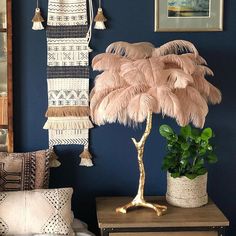 a living room filled with furniture and pictures hanging on the wall above it's head