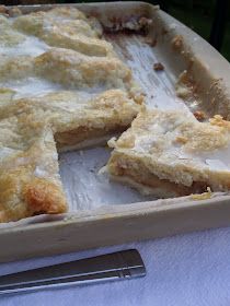 there is a pie that has been cut in half and ready to be eaten on the table